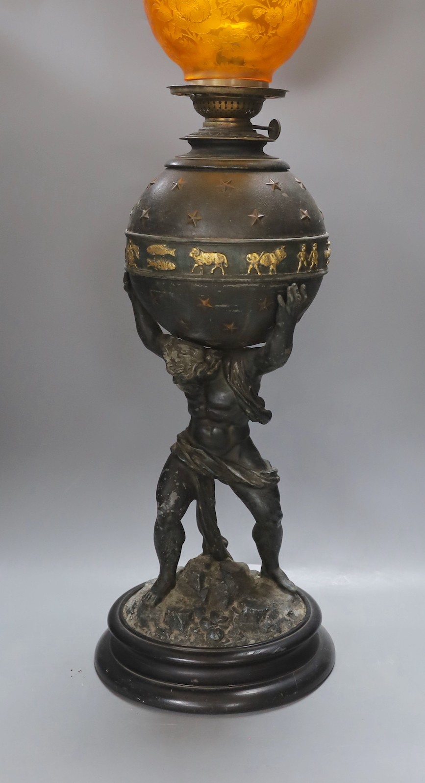 A spelter 'Atlas' oil lamp - 82.5cm tall